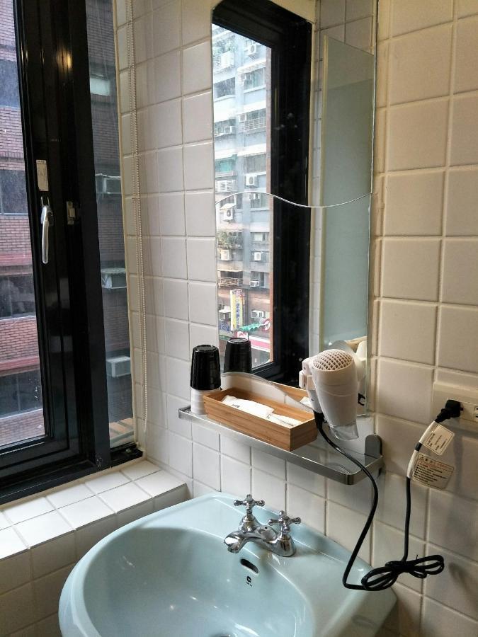 Sunshine Ximen Inn 3*